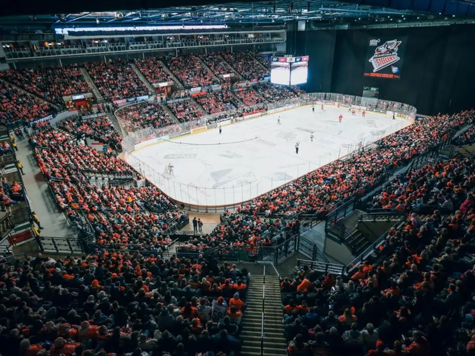 Sheffield Arena became the home of one of British ice hockey's greatest success stories during the 1990s. Interior view of Sheffield Arena during an ice hockey match, showing the rink, spectator seating and scoreboard.