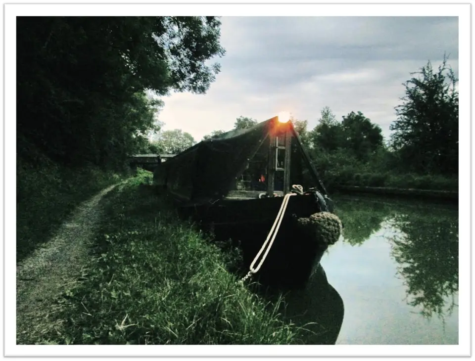 Erica headlamp (comp).jpg The Erica moored in the evening on the Grand Union Canal with the headlamp on.