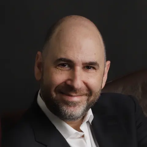 Cracking the Code: Mastering EOS for Business Excellence | Howard Mann | Ep 122