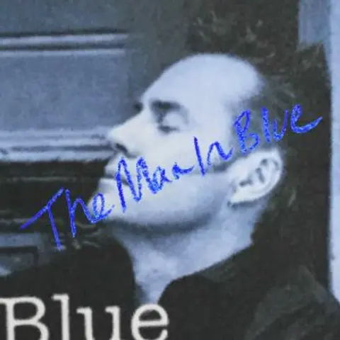 The Man In Blue