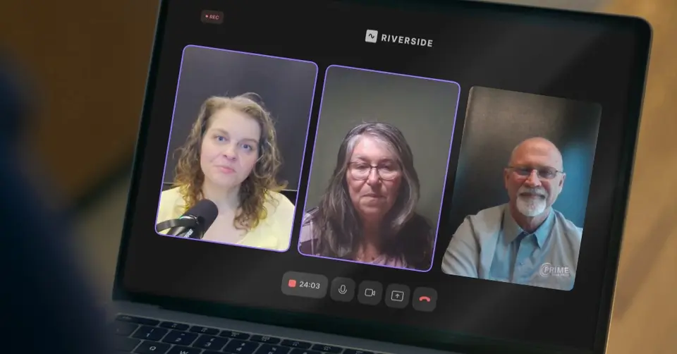 Computer screen shows all three hosts talking together.