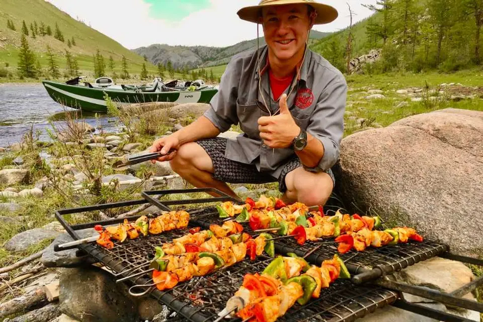 Mongolia shore lunch taimen fly fishing